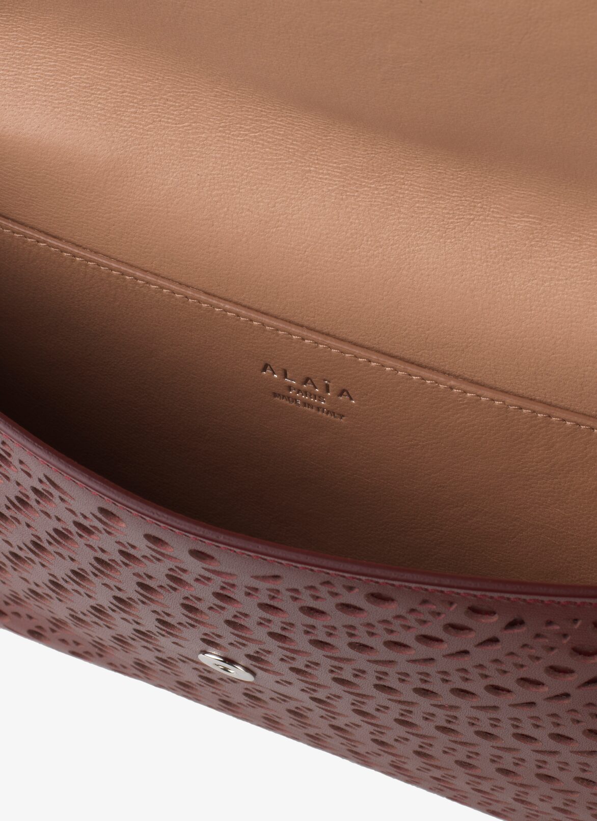 POCHETTE CUIR LUX MINI NEW VIENNE GRENAT ALAÏA  POCHETTE CUIR LUX MINI NEW VIENNE GRENAT ROUGE GRENAT